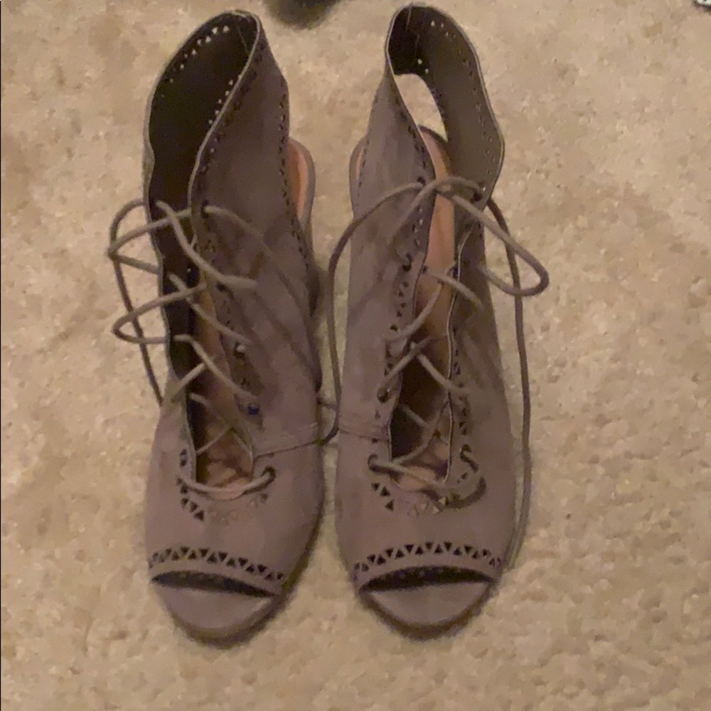 Heeled sandals.